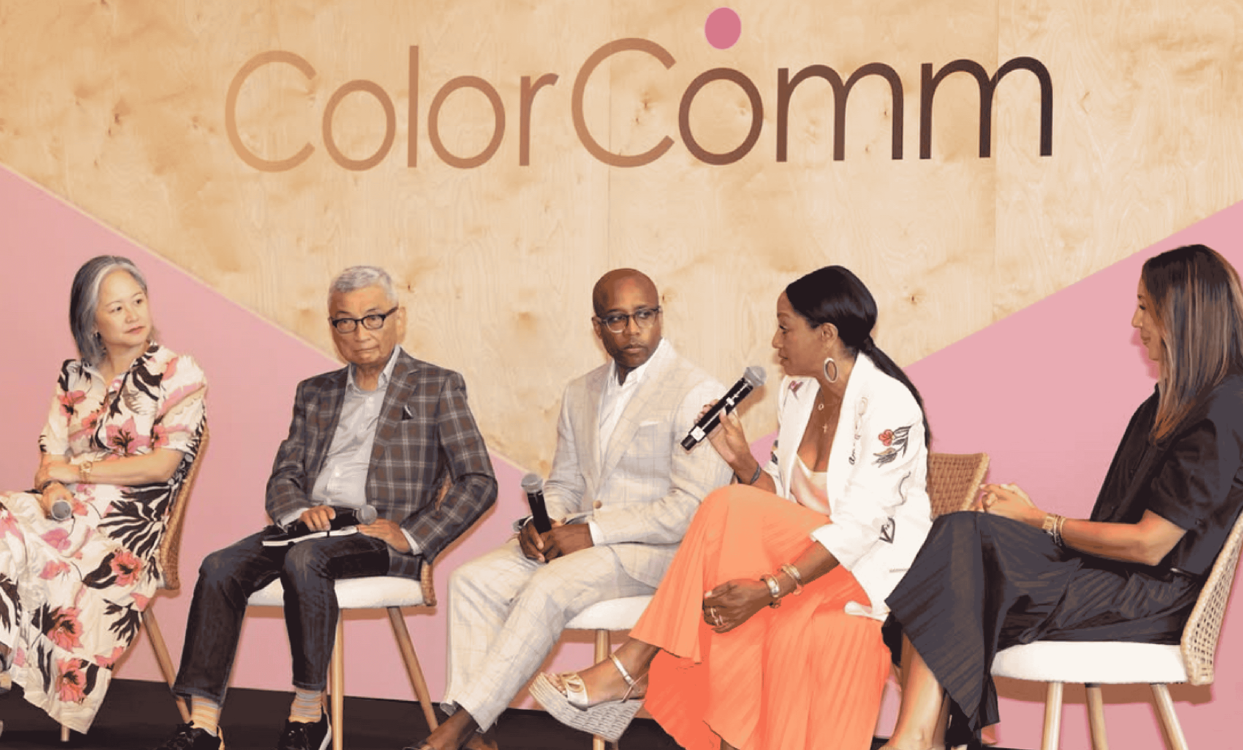 Five ColorComm speakers on stage at their 10th annual conference.
